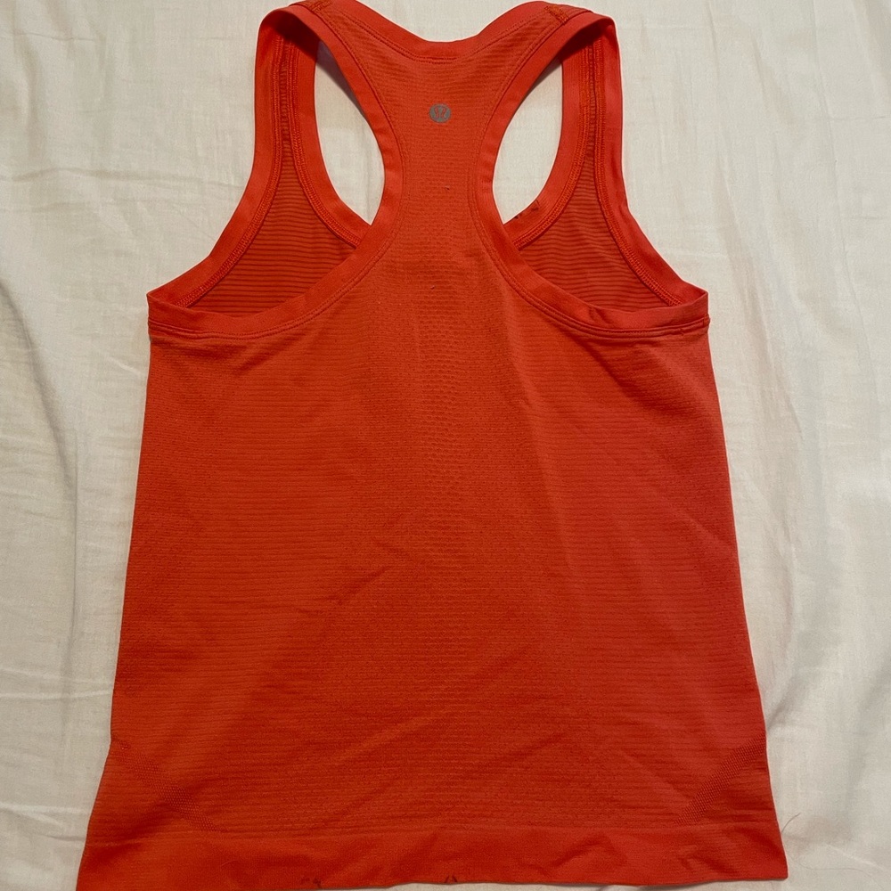 Orange lululemon swiftly tech, size 2